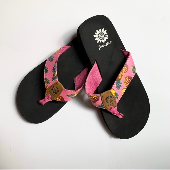 yellow box pineapple flip flops